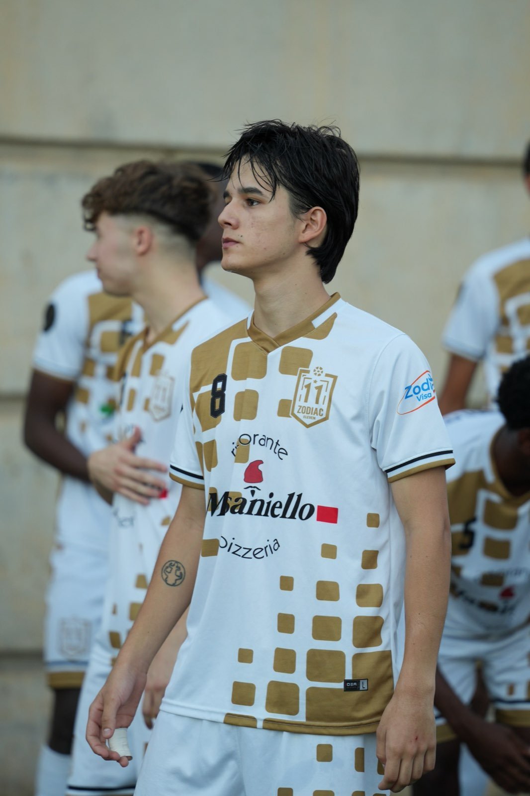 Zodiac Eleven player in match kit