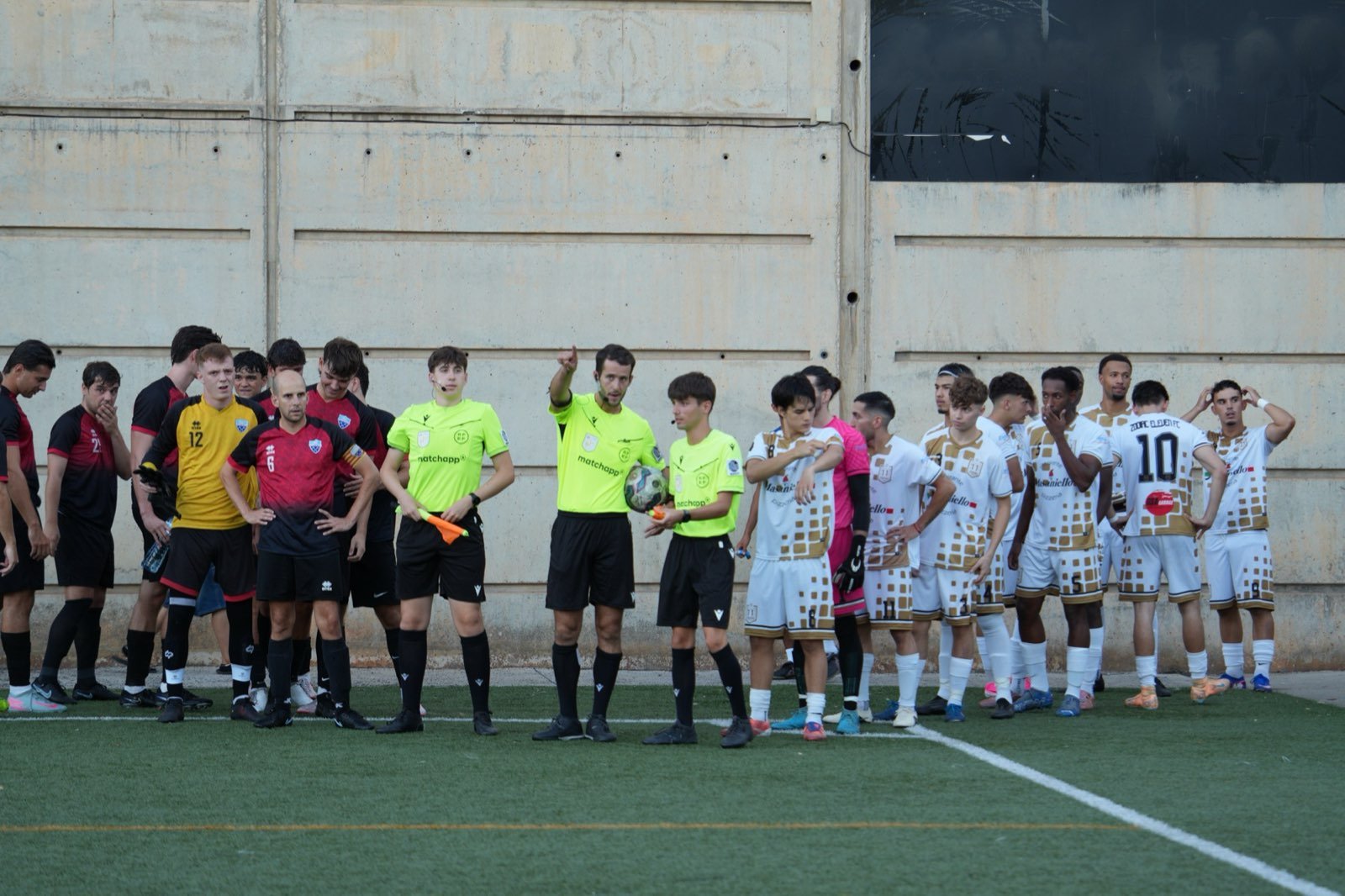 Zodiac Eleven and opponents lining up with match officials