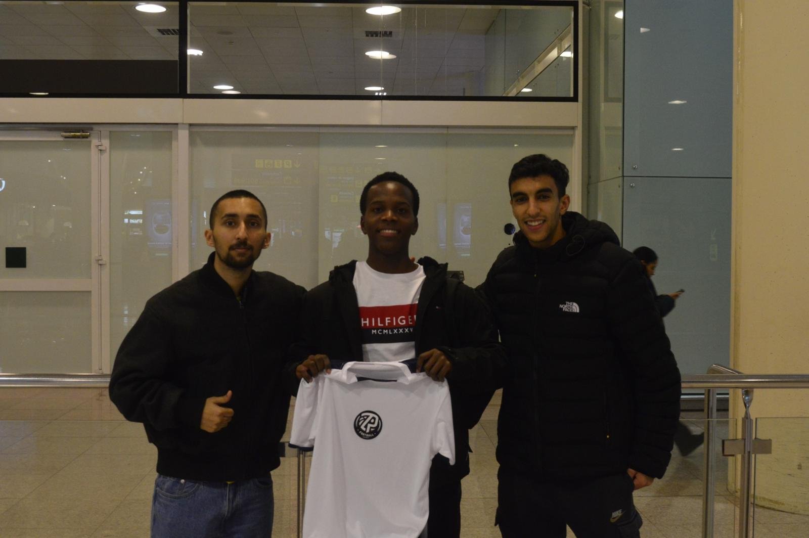 Zodiac Pro team welcoming a player at the airport